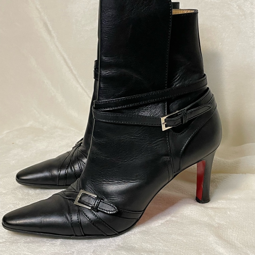 Christian Louboutin ankle wrap boots 3.5 in heel height 3 in shaft.